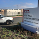 In this June 9, 2017, file photo, a vehicle drives into the Otay Mesa detention center in San Diego. In a lawsuit filed Feb. 26, 2018, the American Civil Liberties Union is suing the U.S. government over what it calls the unlawful separation of a Congolese woman and her 7-year-old daughter who sought asylum.